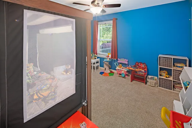 a room with toys and a chandelier