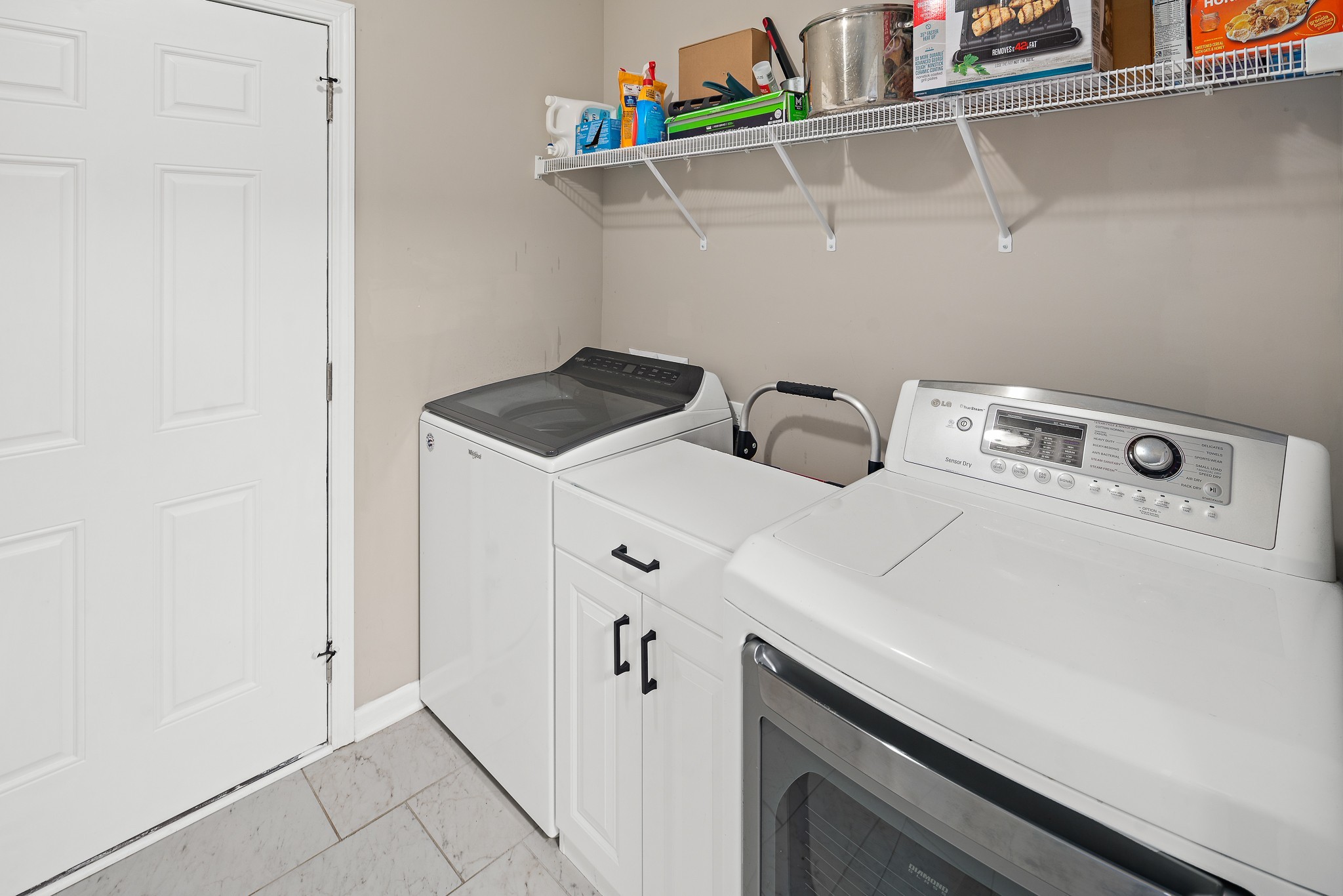 1550 South Spring Street Manchester, TN 37355 - Photo 21 of 26 a utility room with dryer and washer