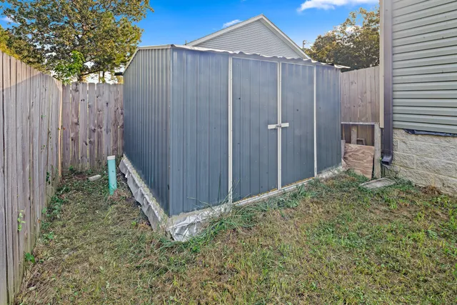 a house view with a backyard space