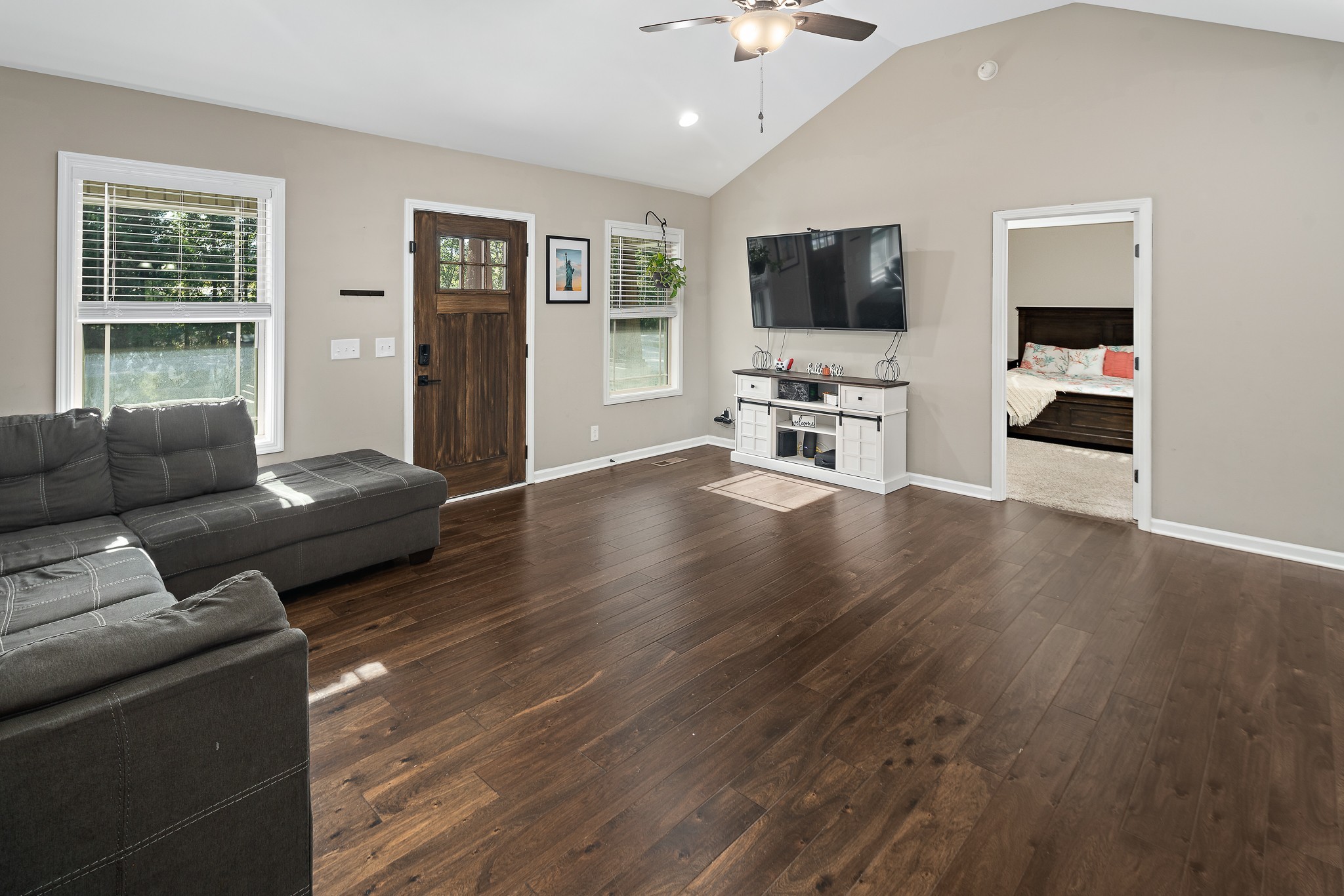 1550 South Spring Street Manchester, TN 37355 - Photo 6 of 26 a living room with furniture and a flat screen tv