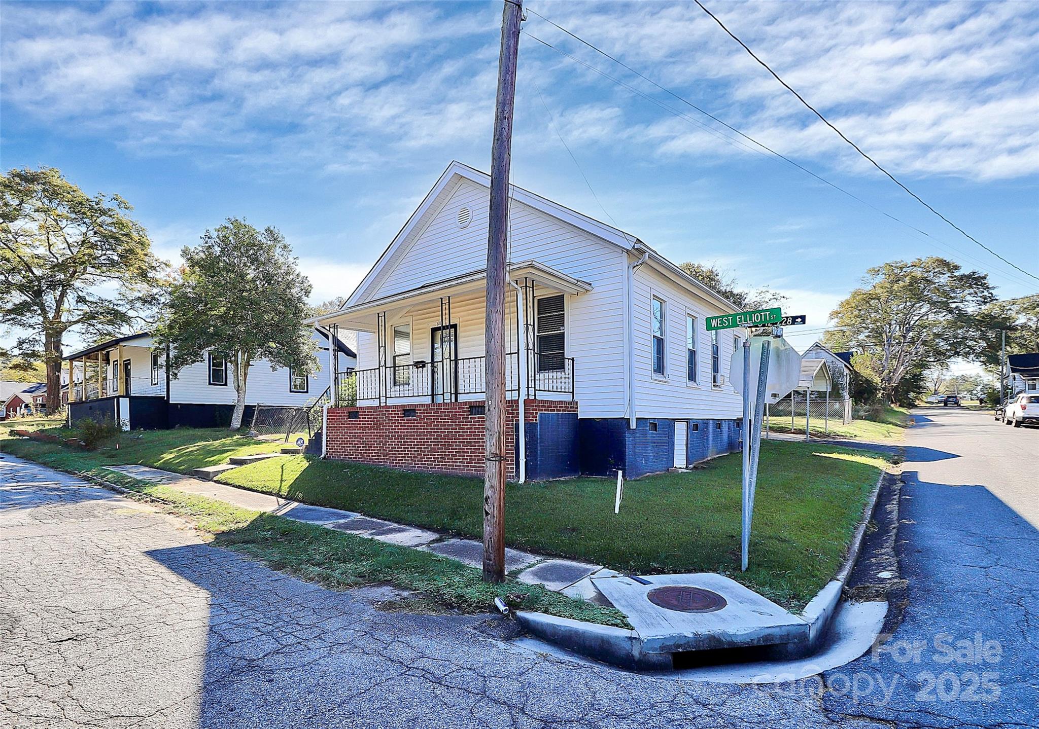511 West Elliott Street Chester, SC 29706 - Photo 2 of 32 a view of a house with a backyard