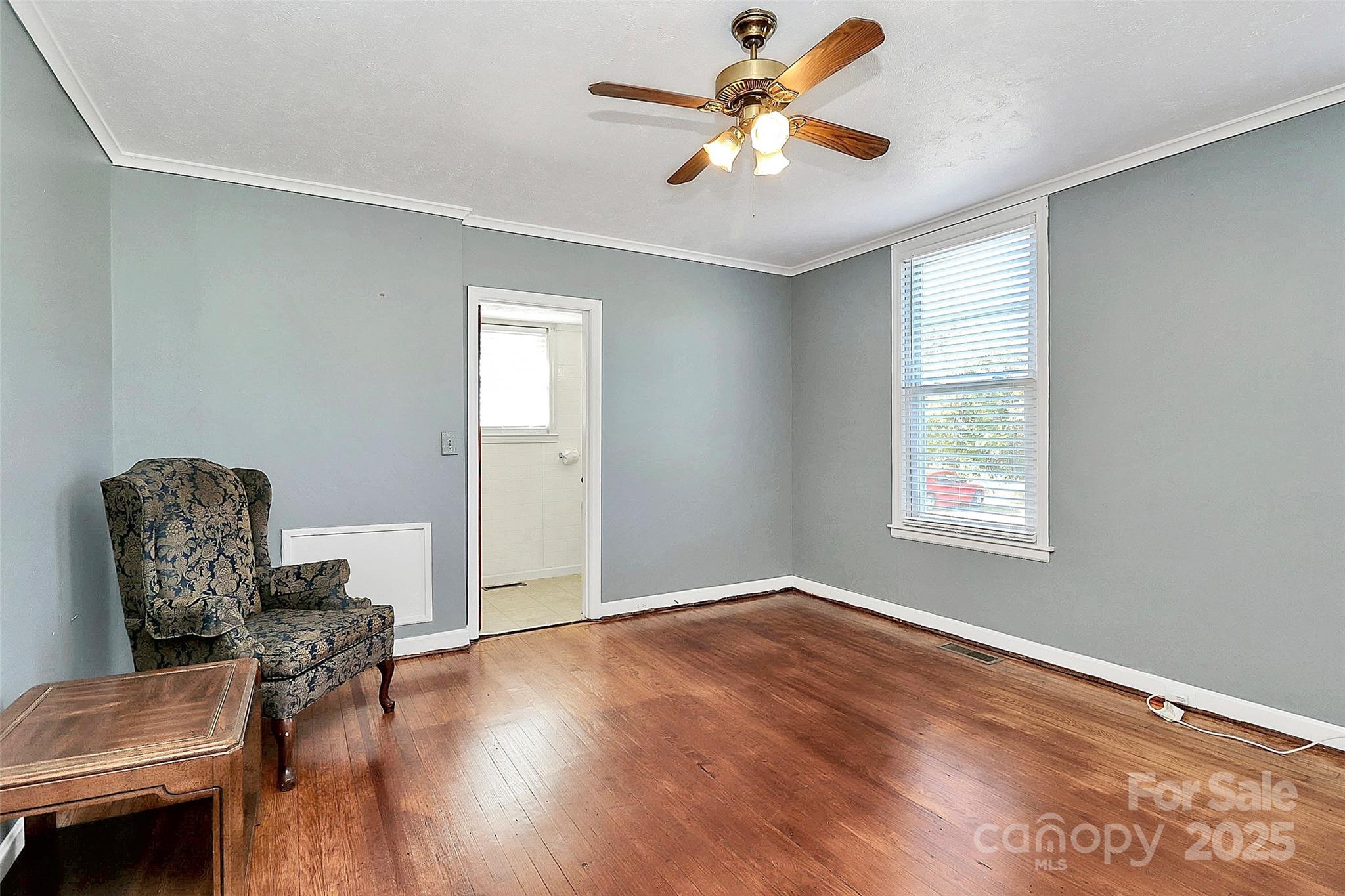 511 West Elliott Street Chester, SC 29706 - Photo 21 of 32 a view of livingroom with hardwood floor and workspace
