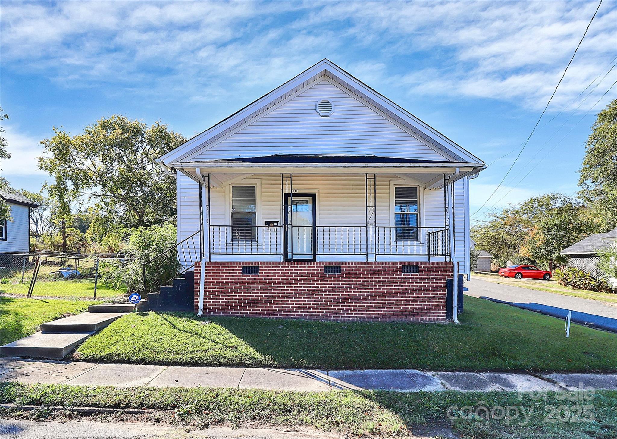 511 West Elliott Street Chester, SC 29706 - Photo 3 of 32 a view of front of a house with a yard