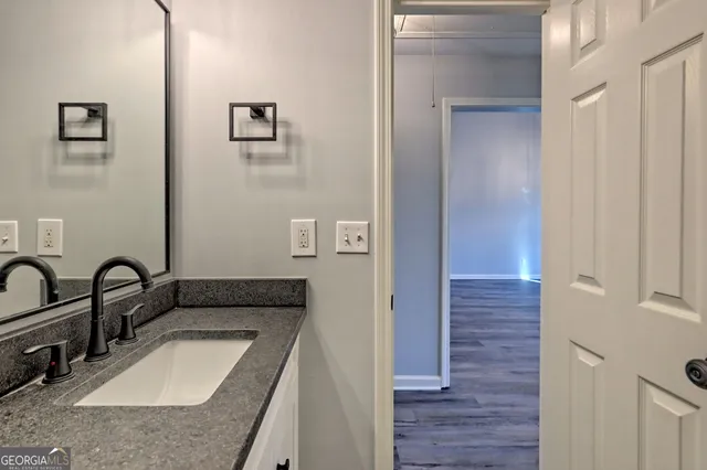 a white bath tub sitting next to a window