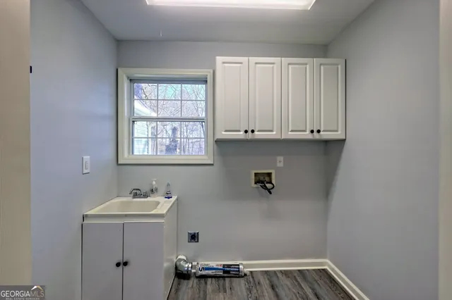 a view of a dry yard with green space