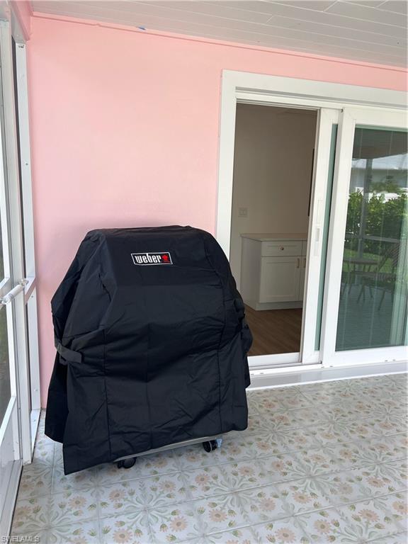 1793 Smugglers Cove, Unit B Naples, FL 34112 - Photo 21 of 23 a view of a car garage door