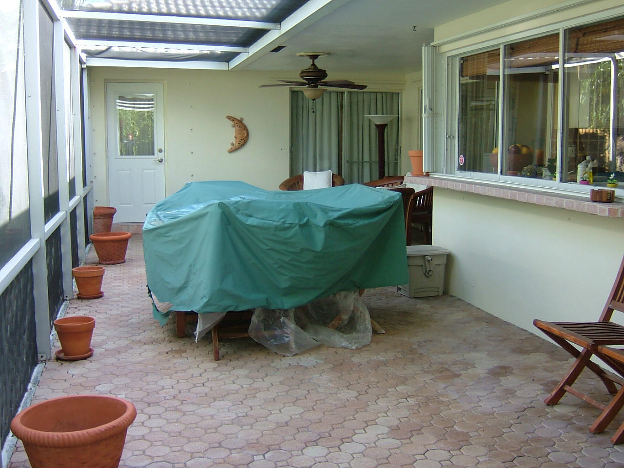 773 Apple Tree Lane Boca Raton, FL 33486 - Photo 12 of 25 a backyard of a house with seating space