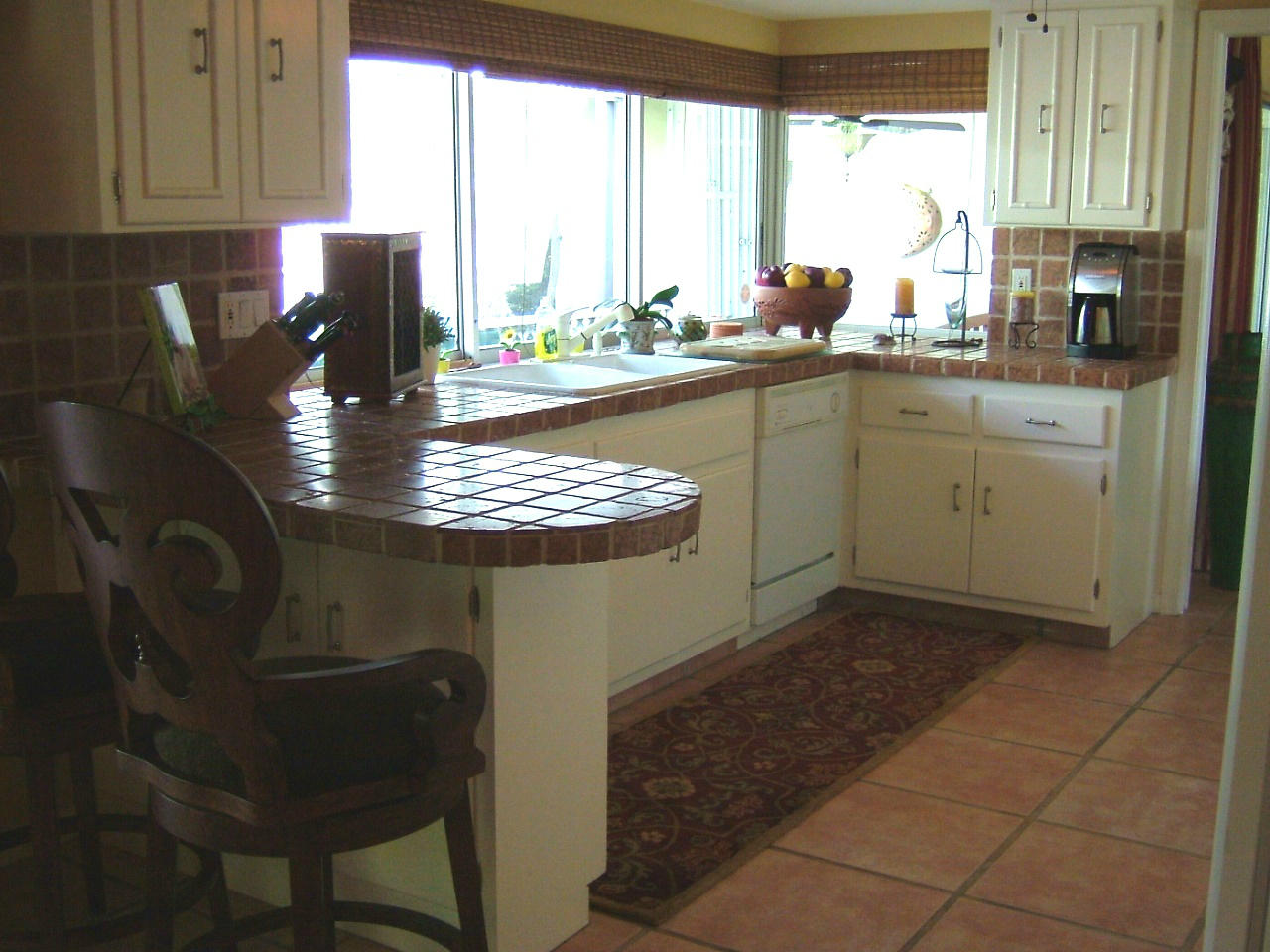 773 Apple Tree Lane Boca Raton, FL 33486 - Photo 8 of 25 a kitchen with a sink cabinets and window
