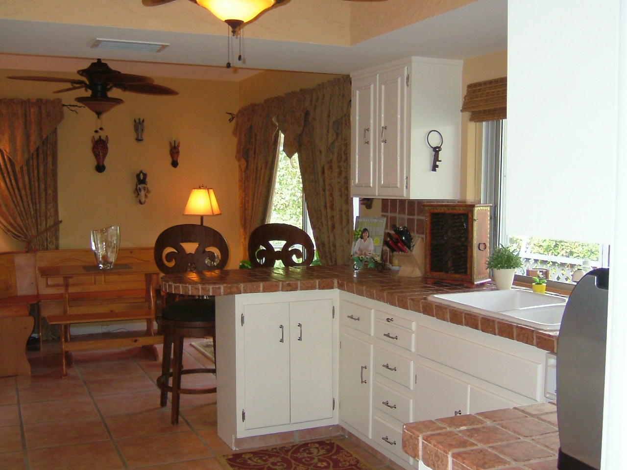 773 Apple Tree Lane Boca Raton, FL 33486 - Photo 9 of 25 a kitchen with cabinets and window