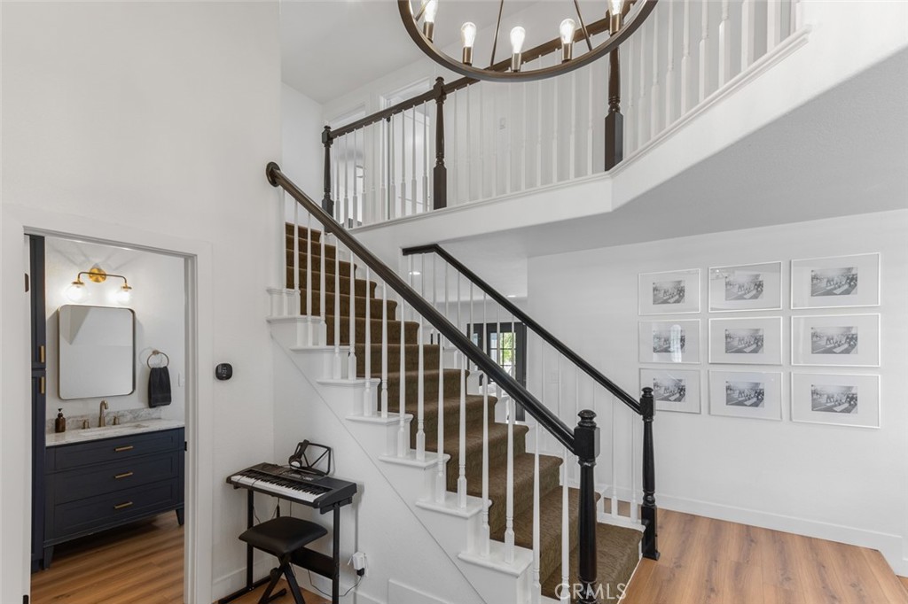 14612 Emerywood Road Tustin, CA 92780 - Photo 11 of 50 Entrance to 1/2 bath and stairway