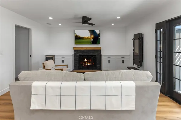 a bedroom with a bed and fireplace