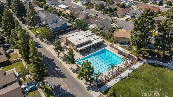 an aerial view of a house with a garden