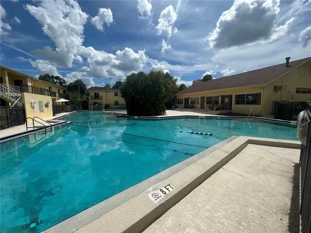 a view of a house with a big yard