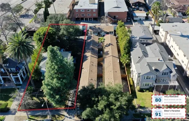 a view of a parked cars in front of a house