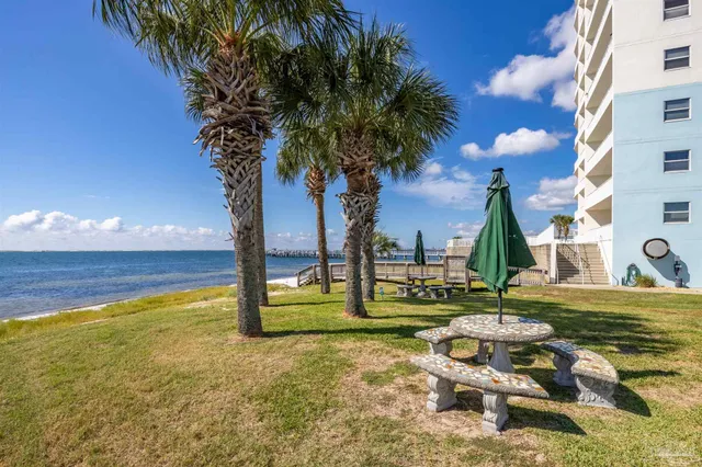 a view of a balcony with an ocean view