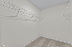 152 North Chubb Ridge Wilson's Mills, NC 27520 - Photo 18 of 22 a view of a room with racks on the wall