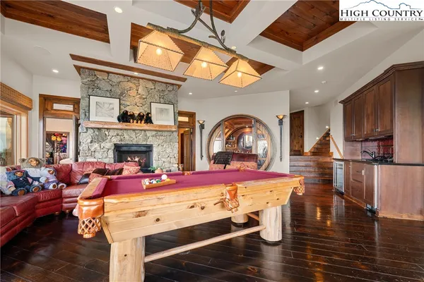a kitchen with granite countertop wooden cabinets and a counter top space