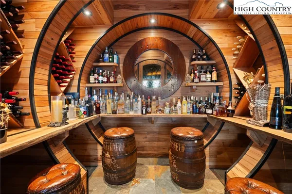 a bedroom with a large bed and a large window