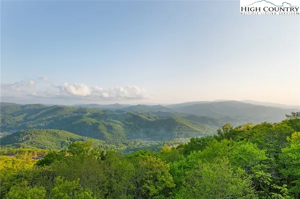 a view of lake with mountain