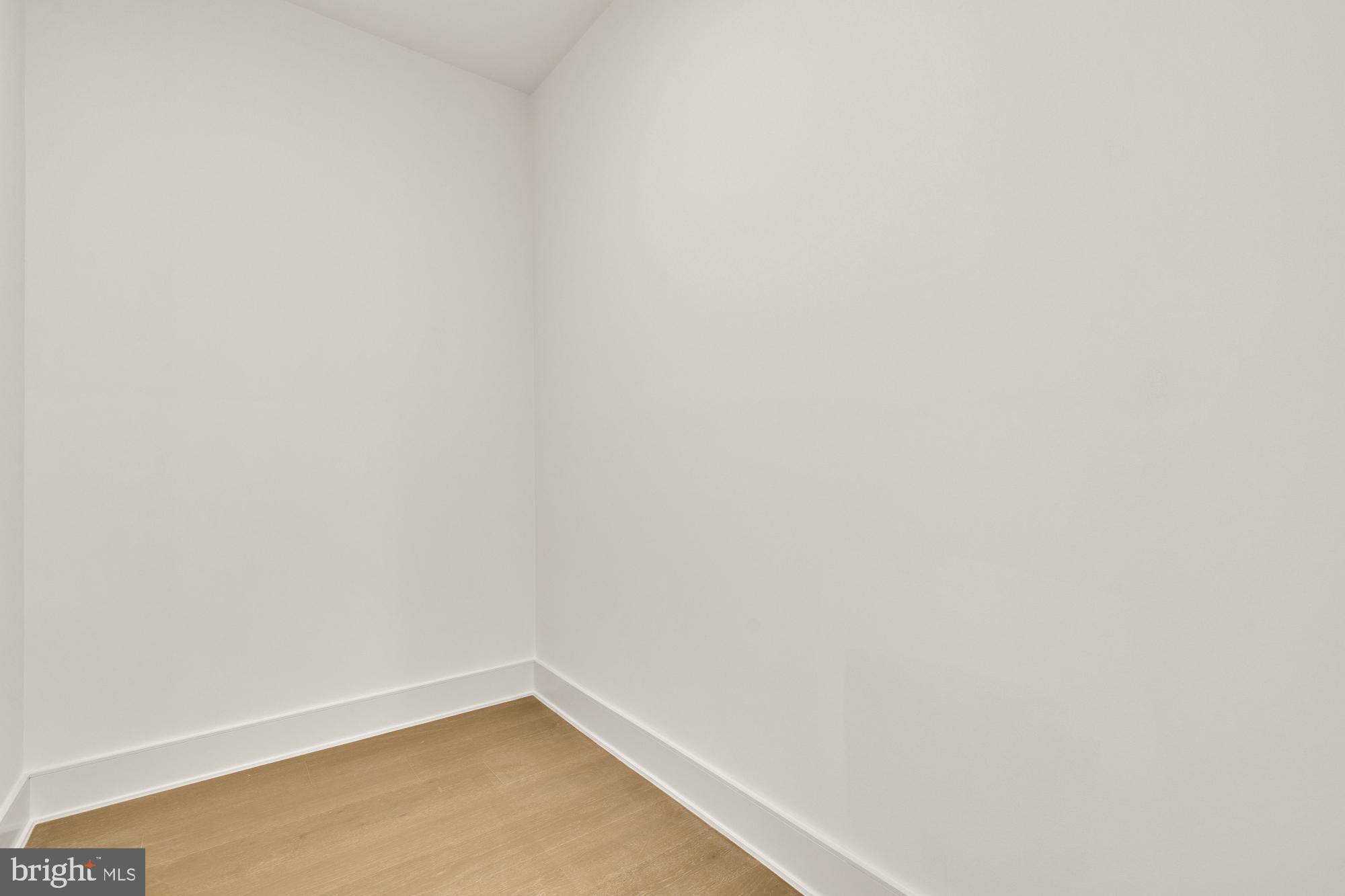 1810 Central Place Northeast, Unit 2 Washington, DC 20002 - Photo 24 of 34 a small space with a white wall