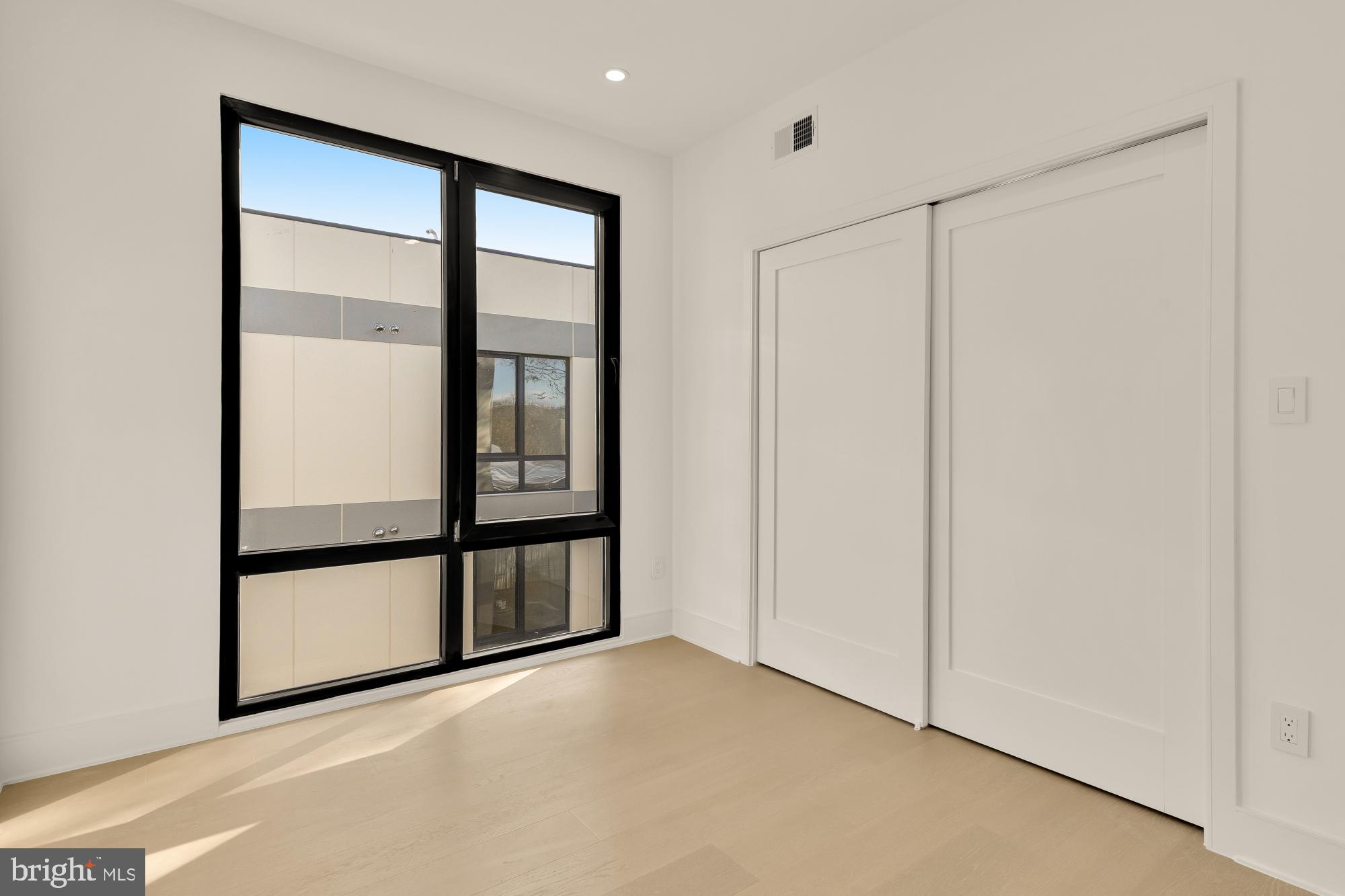 1810 Central Place Northeast, Unit 2 Washington, DC 20002 - Photo 28 of 34 a view of an empty room with a window