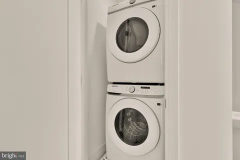 a view of a swimming pool and an outdoor seating