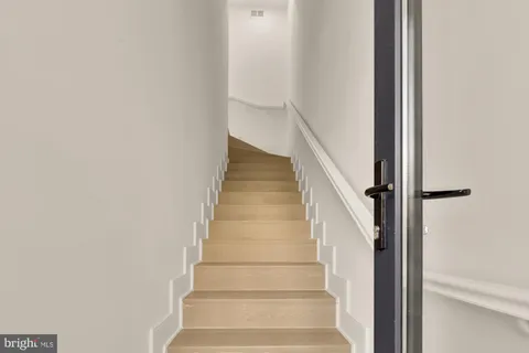 a view of staircase with white walls and white walls