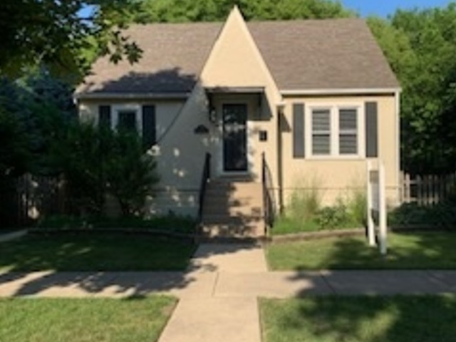 3717 Cleveland Avenue Brookfield, IL 60513 - Photo 1 of 1 a front view of a house with a yard and garden