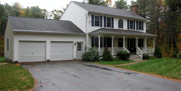 32 Newton Road Westminster, MA 01473 - Photo 1 of 21 a view of a white house with a yard and plants