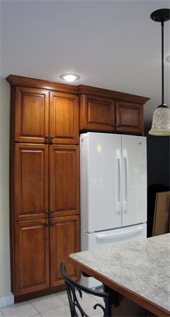 32 Newton Road Westminster, MA 01473 - Photo 19 of 21 a kitchen with a refrigerator and cabinets