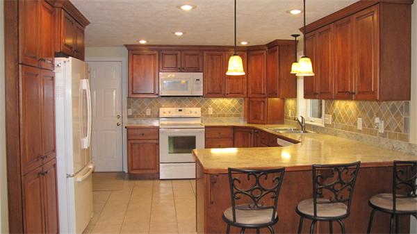 32 Newton Road Westminster, MA 01473 - Photo 2 of 21 a kitchen with stainless steel appliances granite countertop a sink a stove and a refrigerator