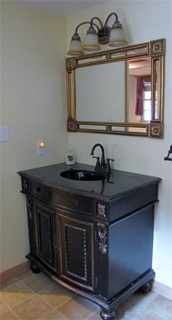 32 Newton Road Westminster, MA 01473 - Photo 21 of 21 a bathroom with a sink and a stove