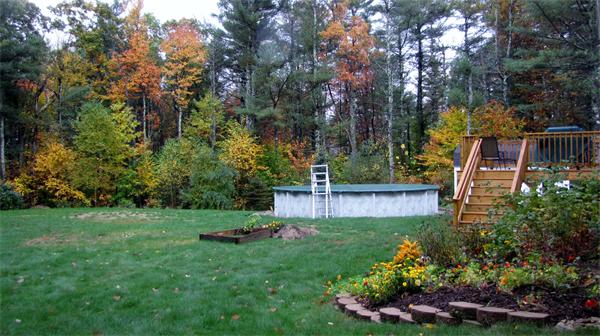 32 Newton Road Westminster, MA 01473 - Photo 3 of 21 a view of a garden with a flower garden
