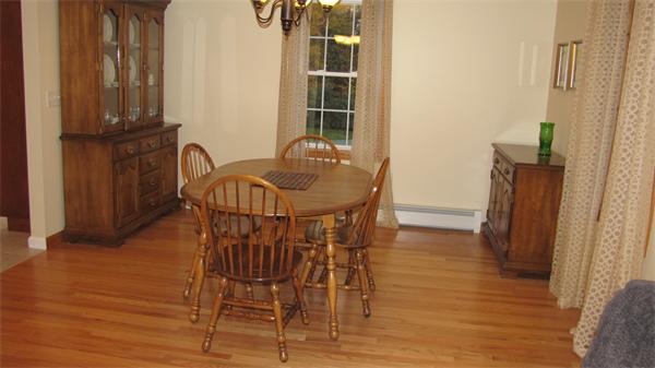 32 Newton Road Westminster, MA 01473 - Photo 7 of 21 a view of a dining room with furniture and wooden floor