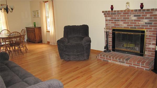 32 Newton Road Westminster, MA 01473 - Photo 9 of 21 a living room with furniture and a fireplace