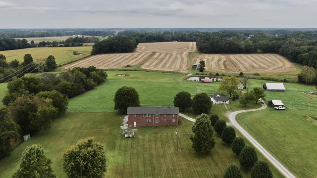 a view of a lake with a yard
