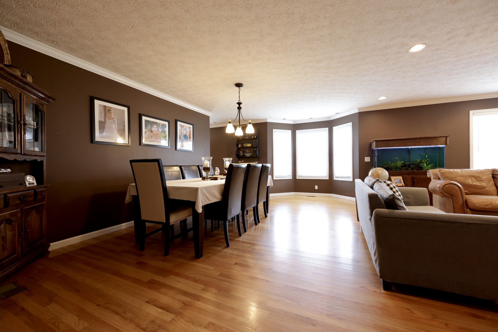 6808 Hester Road Springfield, TN 37172 - Photo 27 of 50 a living room with furniture dining table and a wooden floor
