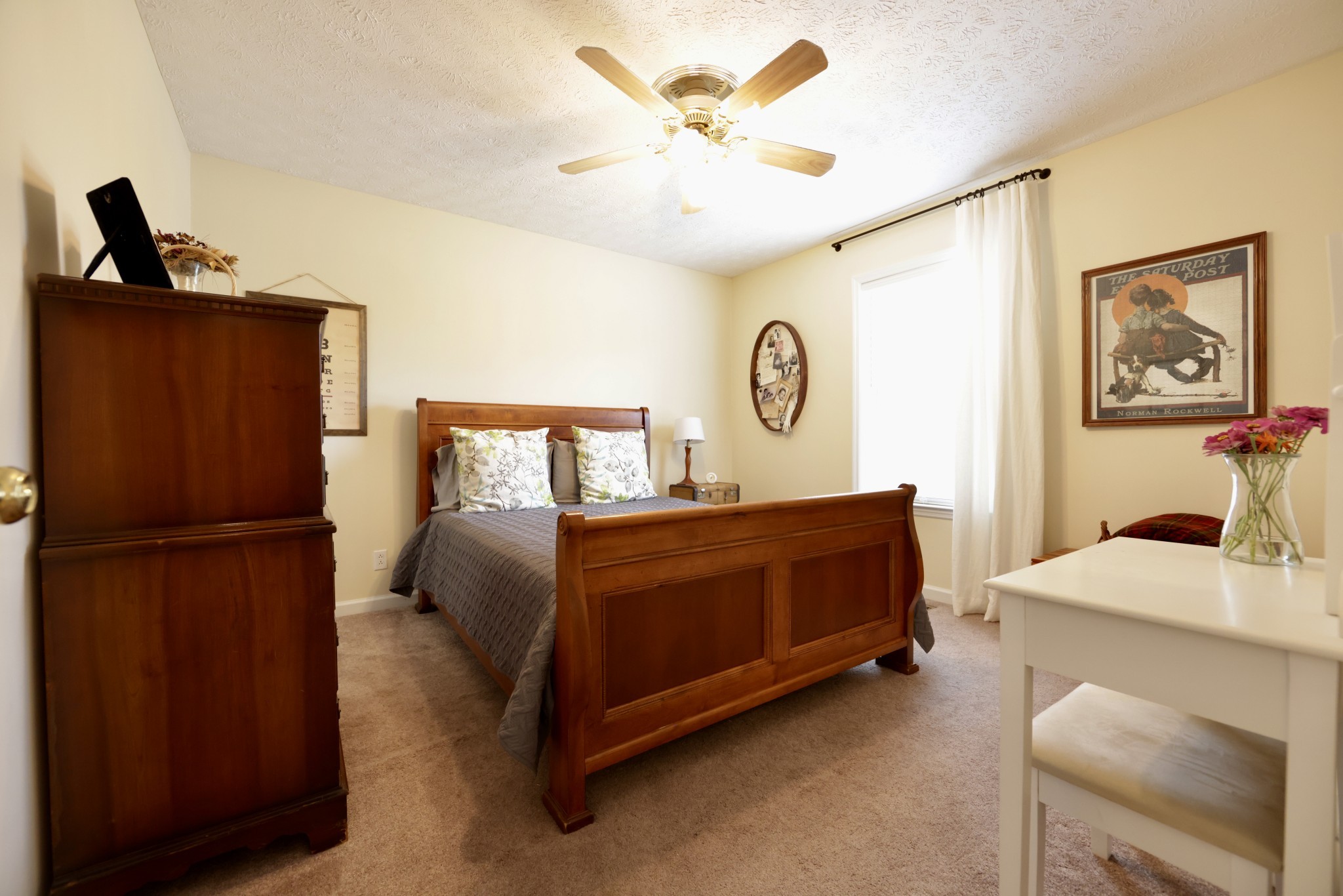 6808 Hester Road Springfield, TN 37172 - Photo 35 of 50 a bedroom with a bed and a painting on the wall