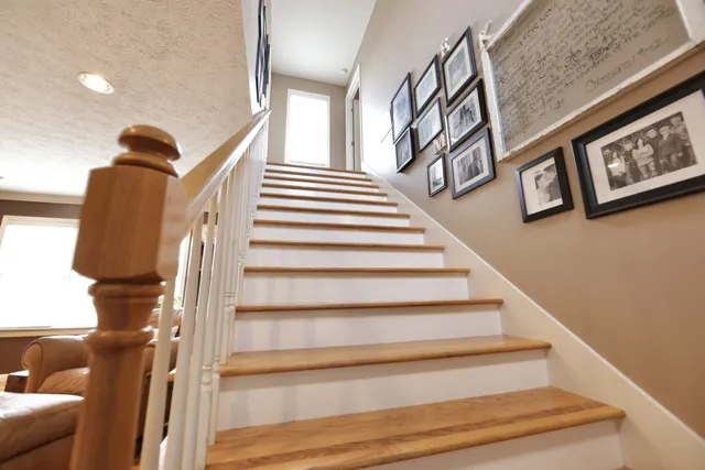 a view of a kitchen with workspace and a window
