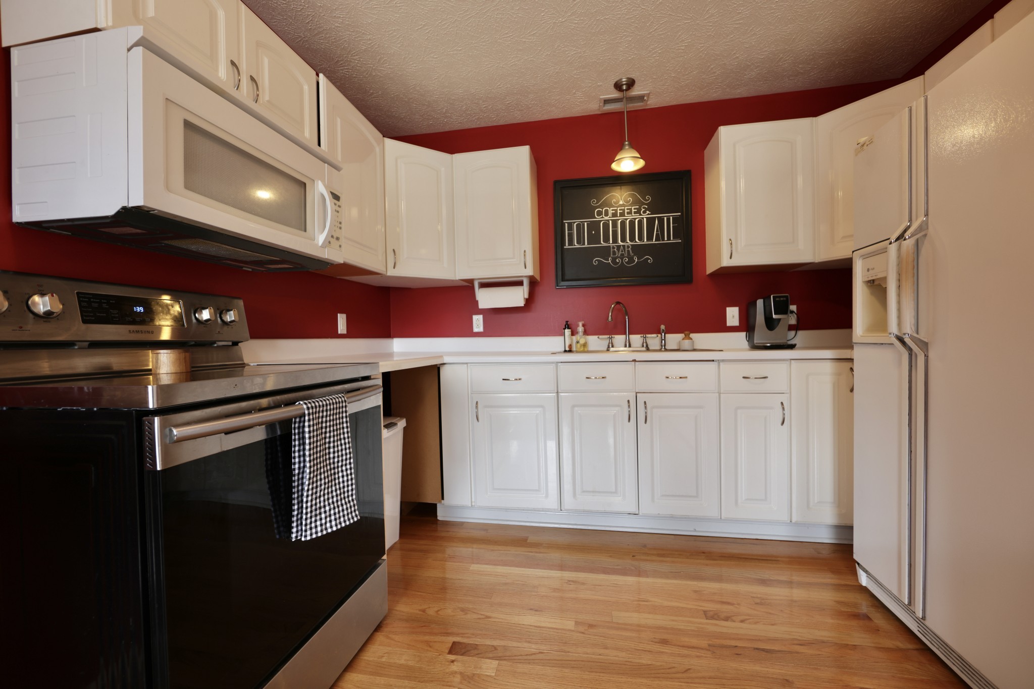 6808 Hester Road Springfield, TN 37172 - Photo 45 of 50 a kitchen with a sink cabinets and stainless steel appliances
