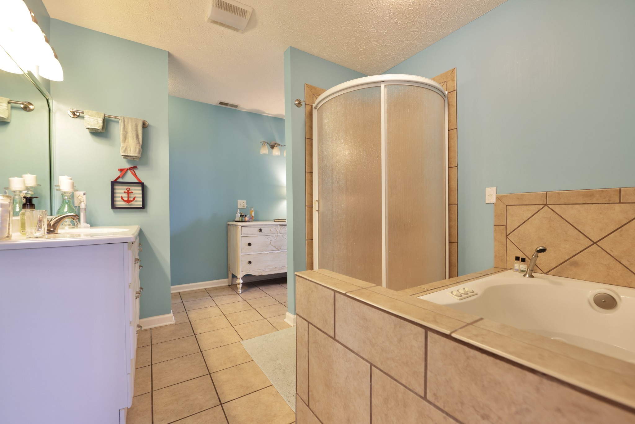 6808 Hester Road Springfield, TN 37172 - Photo 47 of 50 a bathroom with a sink and mirror