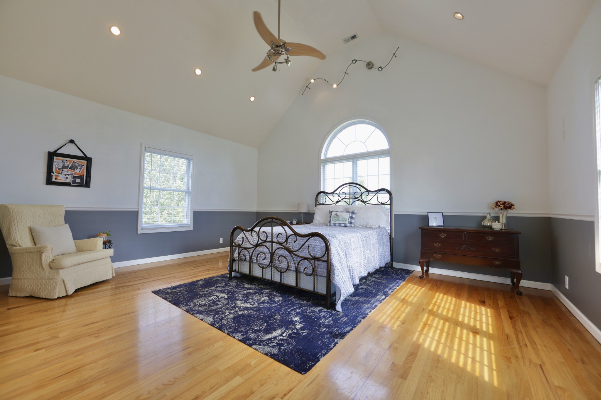 6808 Hester Road Springfield, TN 37172 - Photo 49 of 50 a spacious bedroom with a bed and a couch