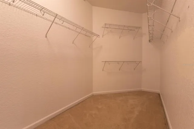 a view of a room with racks on the wall