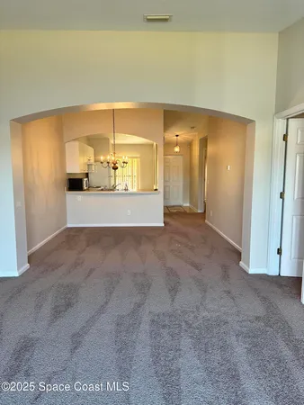 a view of a livingroom with a staircase