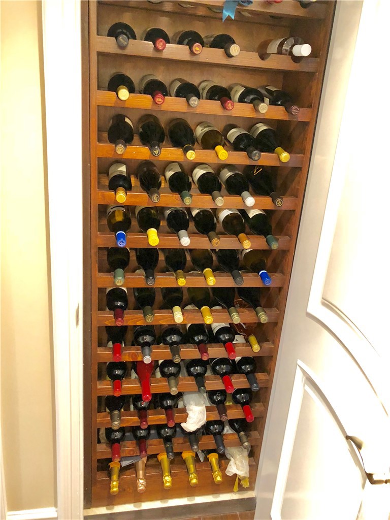 15 Curl Drive Corona del Mar, CA 92625 - Photo 21 of 26 walk in closet with wooden floor