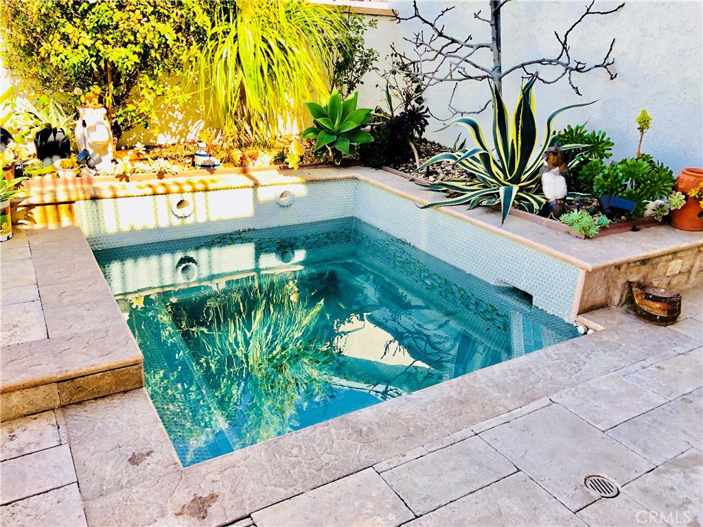 15 Curl Drive Corona del Mar, CA 92625 - Photo 22 of 26 a view of a street with potted plants