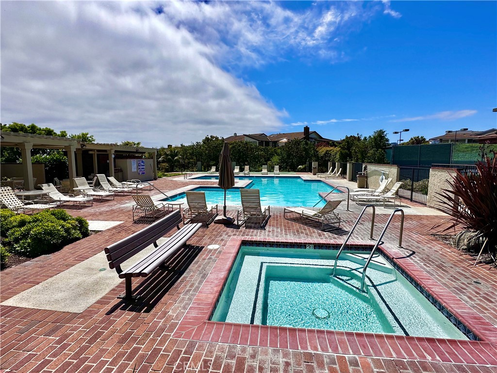15 Curl Drive Corona del Mar, CA 92625 - Photo 23 of 26 a view of swimming pool with lounge chairs in patio