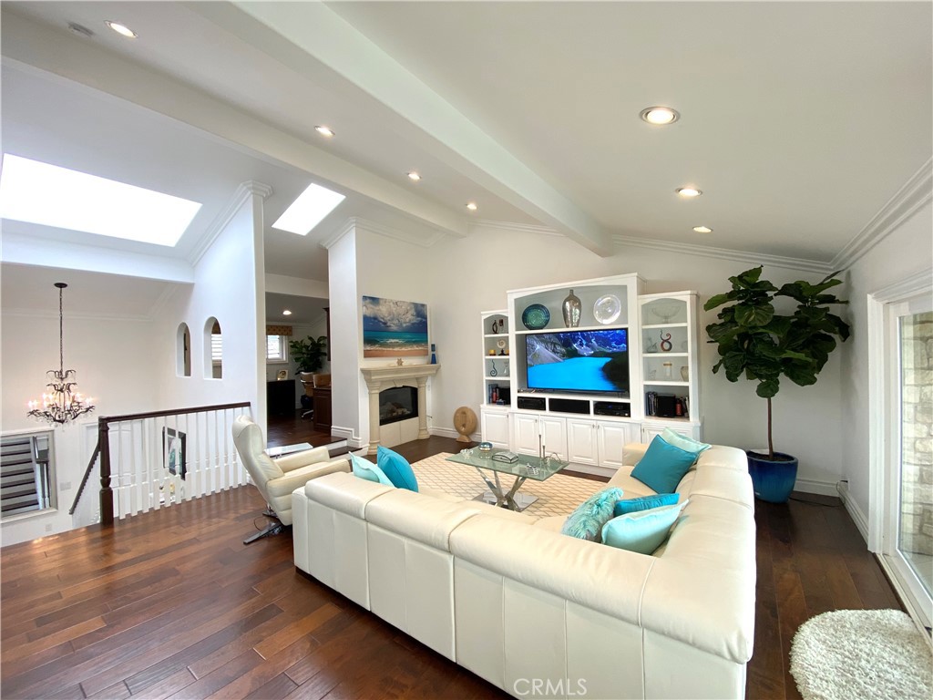 15 Curl Drive Corona del Mar, CA 92625 - Photo 4 of 26 a living room with furniture and a flat screen tv