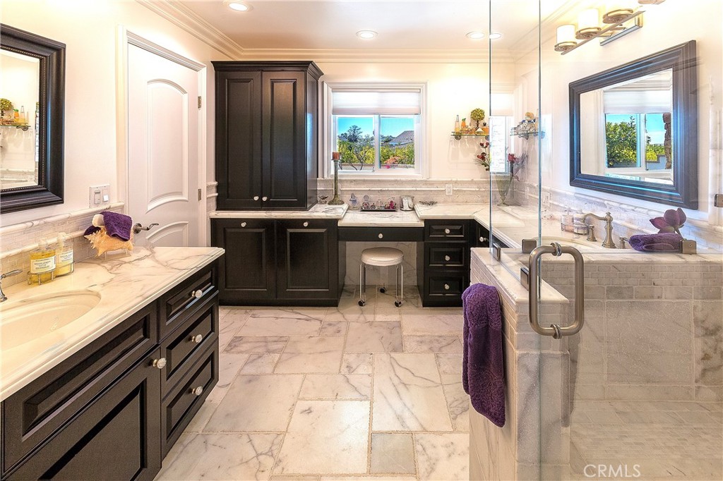 15 Curl Drive Corona del Mar, CA 92625 - Photo 10 of 26 a kitchen with a sink and large windows