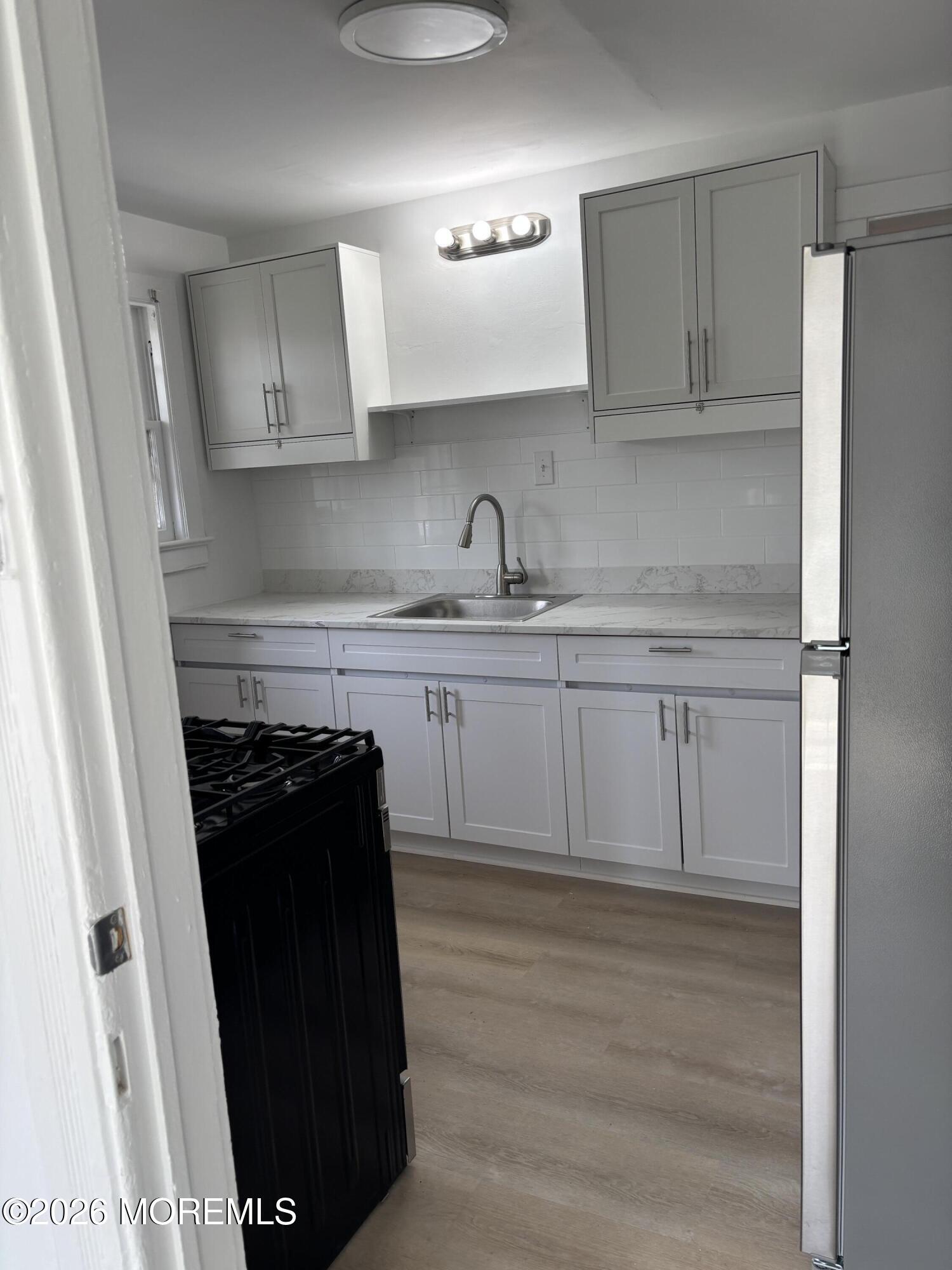 68 Maple Avenue, Unit REAR Red Bank, NJ 07701 - Photo 12 of 21 IMG_2699